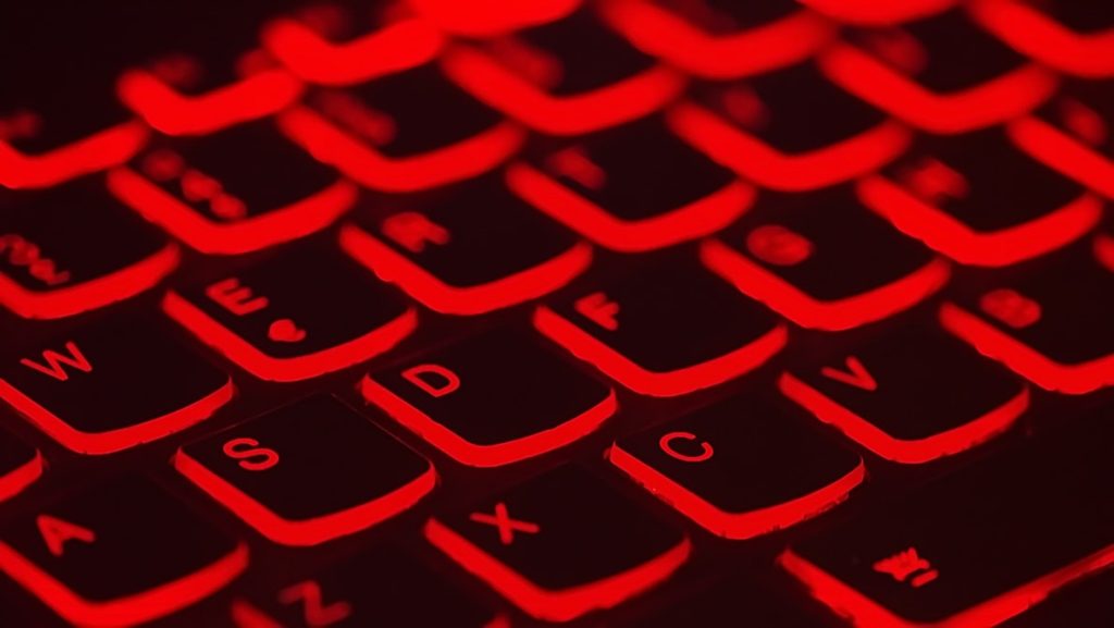 red backlit keyboard of laptop